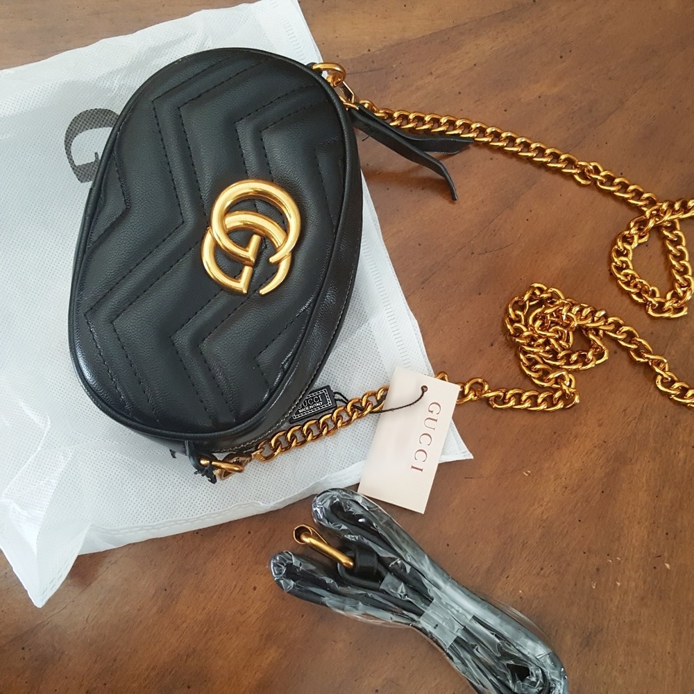 Gucci fanny pack or purse with chain